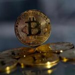 "Les ETF bitcoin spot, lancés en 2024, atteignent presque 50 milliards de dollars d'actifs nets cumulés."